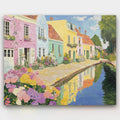 Canal of Dreams paint by numbers kit of a European canal lined with colorful houses and flowers