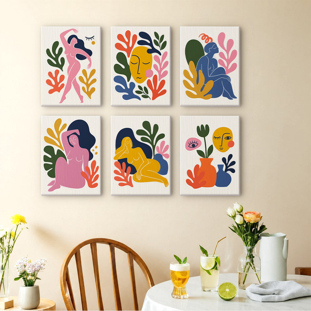 Abstract Figures mini paintings displayed as a gallery wall in a sunny kitchen