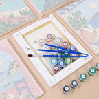Numbered paint pots and brushes on a pre-stretched Aegean Daydream mini canvas