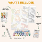 What's included in the Amphibian Symphony paint by numbers kit: numbered linen canvas, reference sheet, color guide, 24 acrylic paints, 3 brushes and thank you card