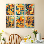 Ancient Egypt mini paintings displayed as a gallery wall in a sunny kitchen