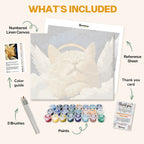 What's included in the Angelic Paws paint by numbers kit: numbered linen canvas, reference sheet, color guide, 24 acrylic paints, 3 brushes and thank you card