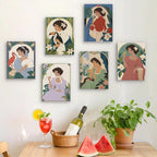 Six finished Art Nouveau Muses mini paintings hung on a wall above a table