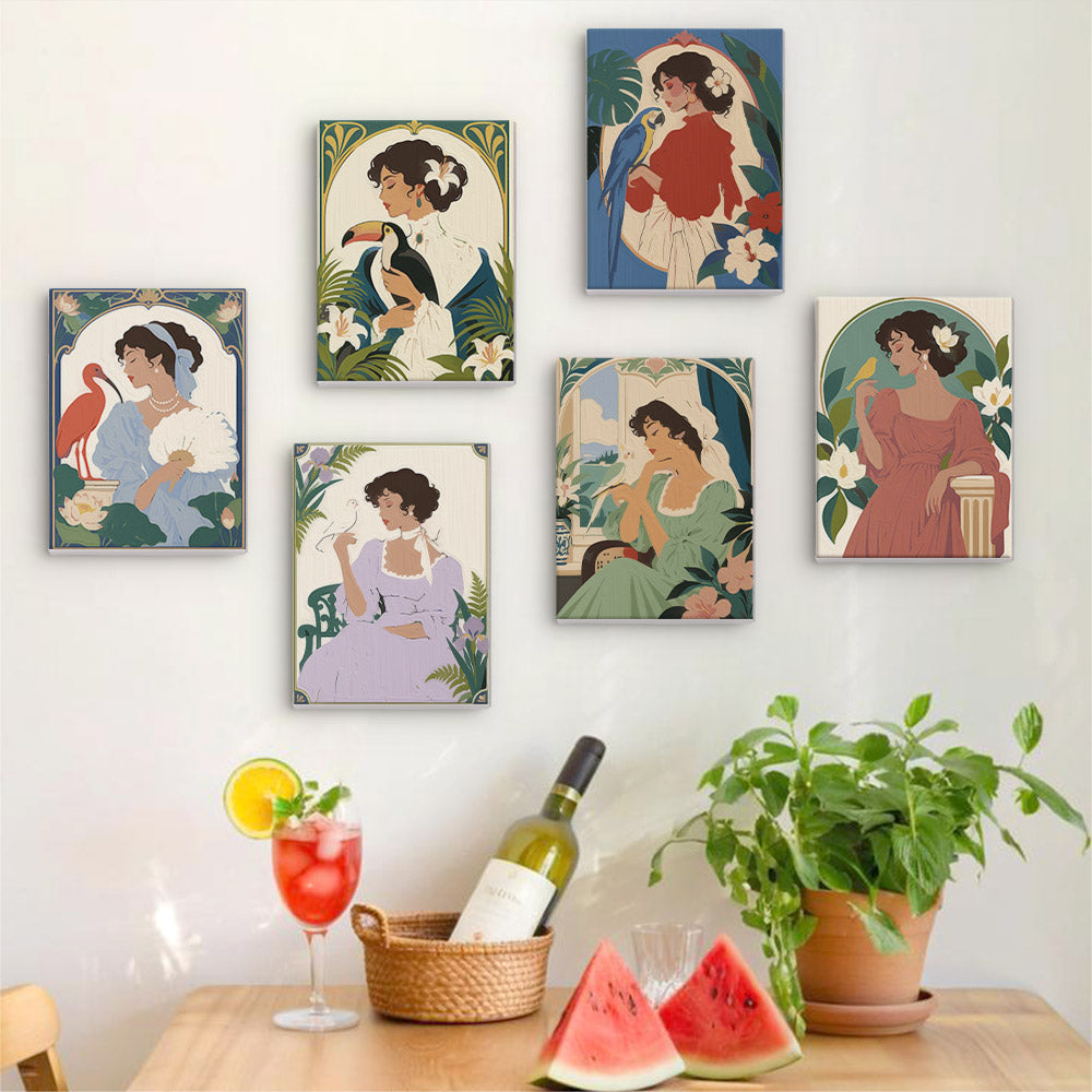 Six finished Art Nouveau Muses mini paintings hung on a wall above a table