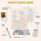 What's included in the Autumn Whispers paint by numbers kit: numbered linen canvas, reference sheet, color guide, 24 acrylic paints, 3 brushes and thank you card