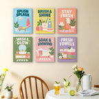 Bathroom Bliss mini paintings displayed as a gallery wall in a sunny kitchen