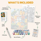 What's included in the Bay of Colors paint by numbers kit: numbered linen canvas, reference sheet, color guide, 24 acrylic paints, 3 brushes and thank you card