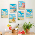 Six finished Beach Day mini paintings hung on a wall above a table