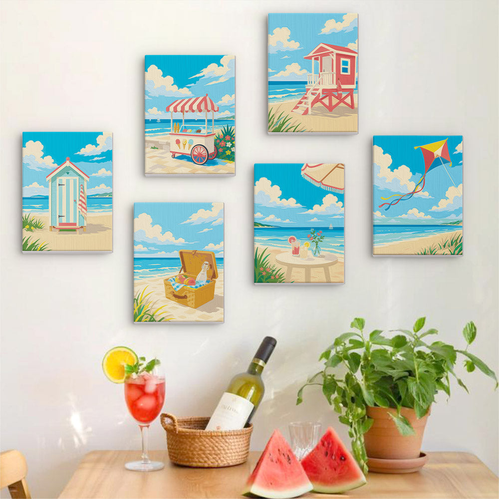 Six finished Beach Day mini paintings hung on a wall above a table