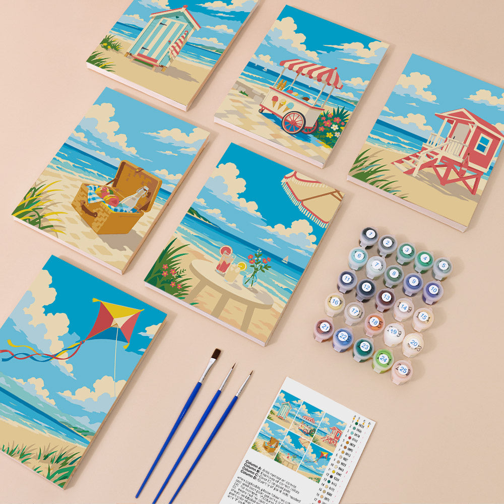 Beach Day mini paint by numbers kit with six numbered canvases, acrylic paints, brushes and layout