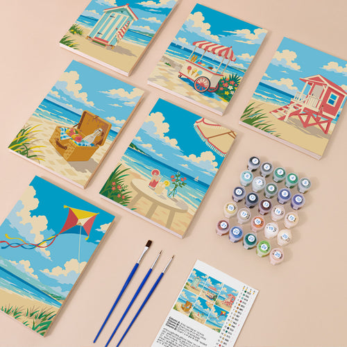 Beach Day mini paint by numbers kit with six numbered canvases, acrylic paints, brushes and layout