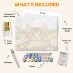 What's included in the Behind the Wall paint by numbers kit: numbered linen canvas, reference sheet, color guide, 24 acrylic paints, 3 brushes and thank you card