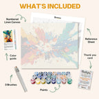 What's included in the Big Bang of Color paint by numbers kit: numbered linen canvas, reference sheet, color guide, 24 acrylic paints, 3 brushes and thank you card