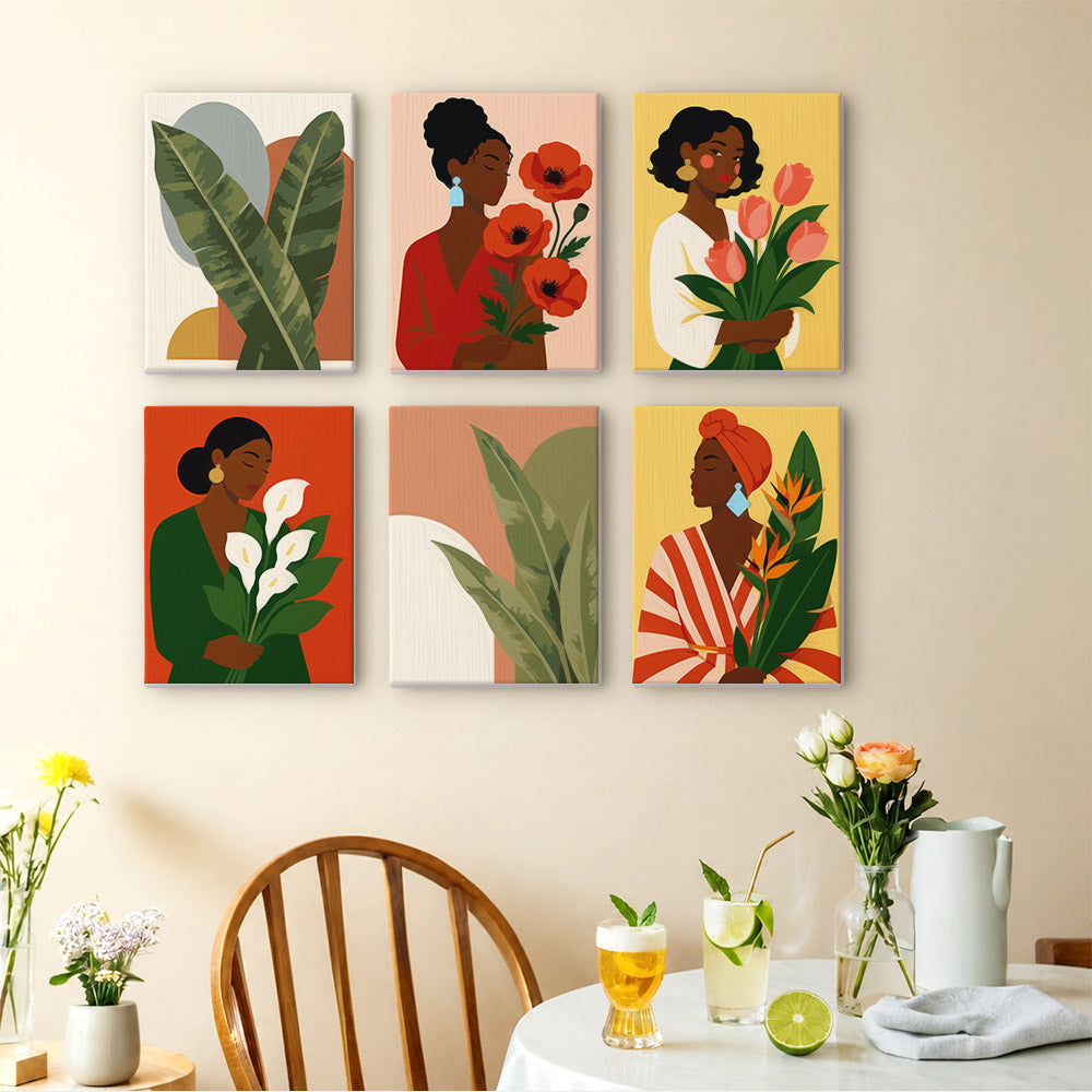 Blooming Muses mini paintings displayed as a gallery wall in a sunny kitchen