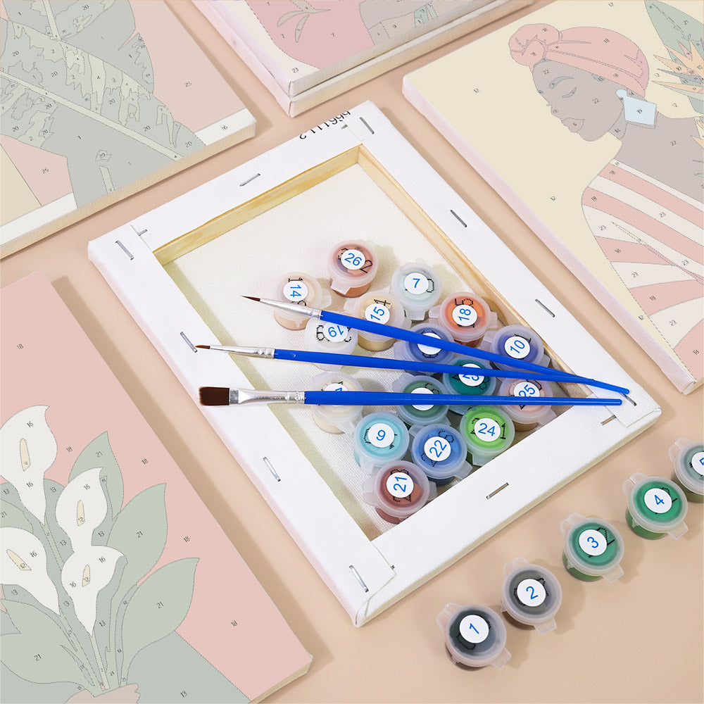 Numbered paint pots and brushes on a pre-stretched Blooming Muses mini canvas