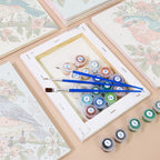 Numbered paint pots and brushes on a pre-stretched Blossom Birds mini canvas