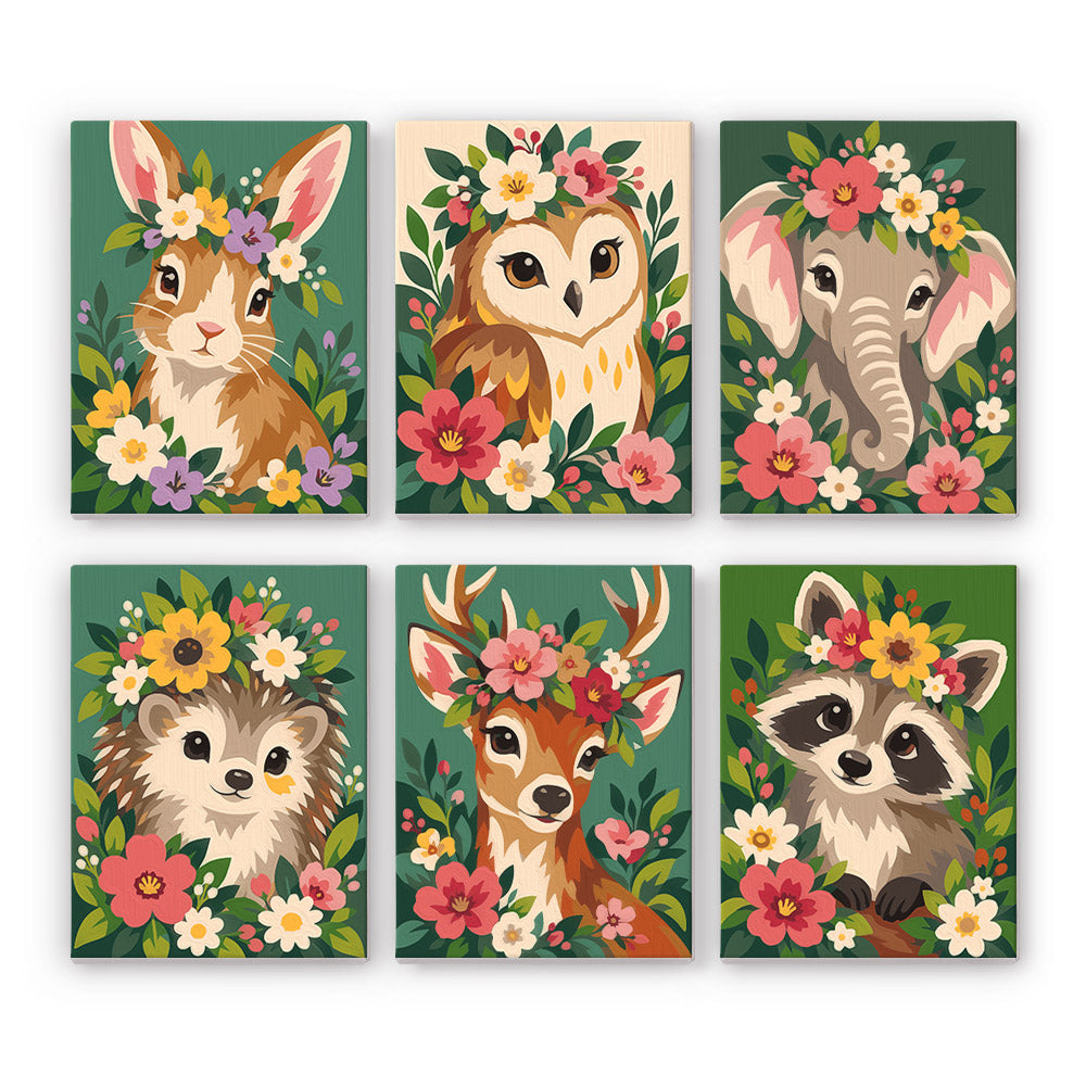 Blossom Critters mini paint by numbers set: six baby animals wearing flower crowns, including a bunny, owl, elephant, hedgehog, deer and raccoon