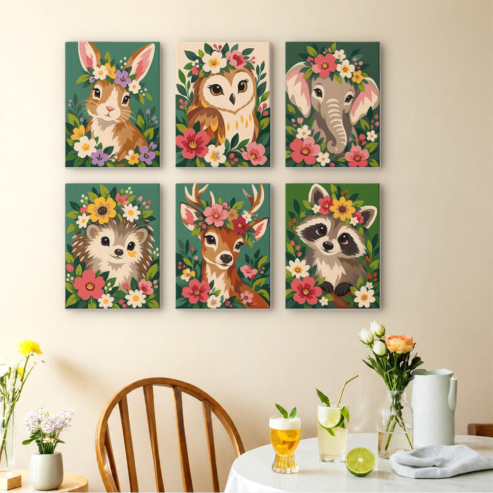 Blossom Critters mini paintings displayed as a gallery wall in a sunny kitchen
