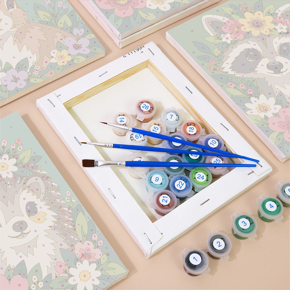 Numbered paint pots and brushes on a pre-stretched Blossom Critters mini canvas