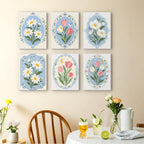 Blue Folk Florals mini paintings displayed as a gallery wall in a sunny kitchen