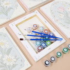 Numbered paint pots and brushes on a pre-stretched Blue Folk Florals mini canvas
