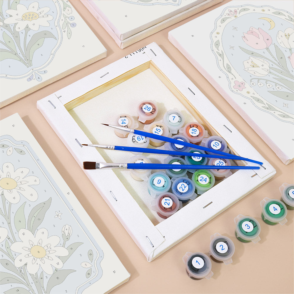 Numbered paint pots and brushes on a pre-stretched Blue Folk Florals mini canvas