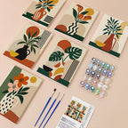 Boho Botanica mini paint by numbers kit with six numbered canvases, acrylic paints, brushes and layout