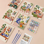 Boho Tea Time mini paint by numbers kit with six numbered canvases, acrylic paints, brushes and layout