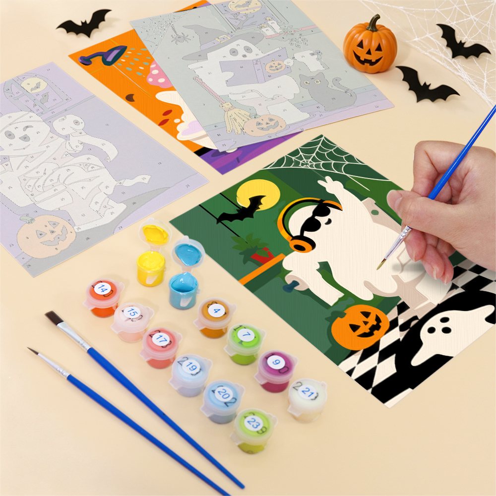 Filling in a Boo Bathroom Buddies mini canvas with numbered acrylic paints and a fine brush