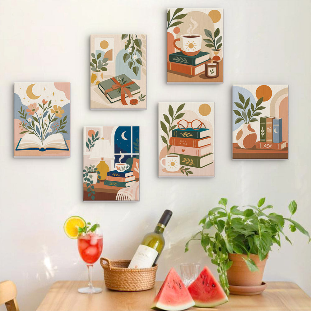 Six finished Book Lover's Corner mini paintings hung on a wall above a table