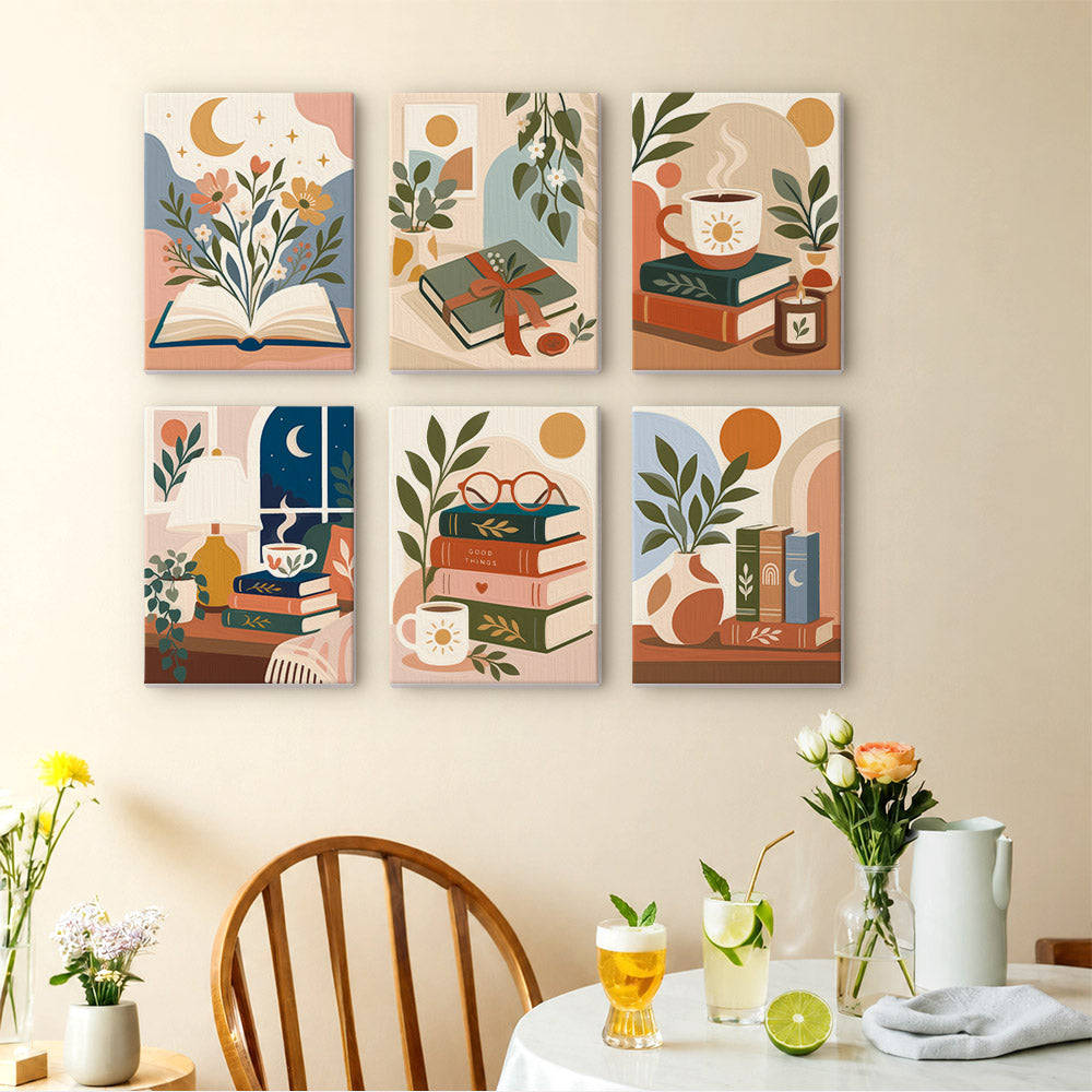 Book Lover's Corner mini paintings displayed as a gallery wall in a sunny kitchen