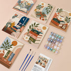 Book Lover's Corner mini paint by numbers kit with six numbered canvases, acrylic paints, brushes and layout