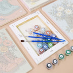 Numbered paint pots and brushes on a pre-stretched Boot Bouquets mini canvas