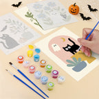 Filling in a Botanical Black Cats mini canvas with numbered acrylic paints and a fine brush
