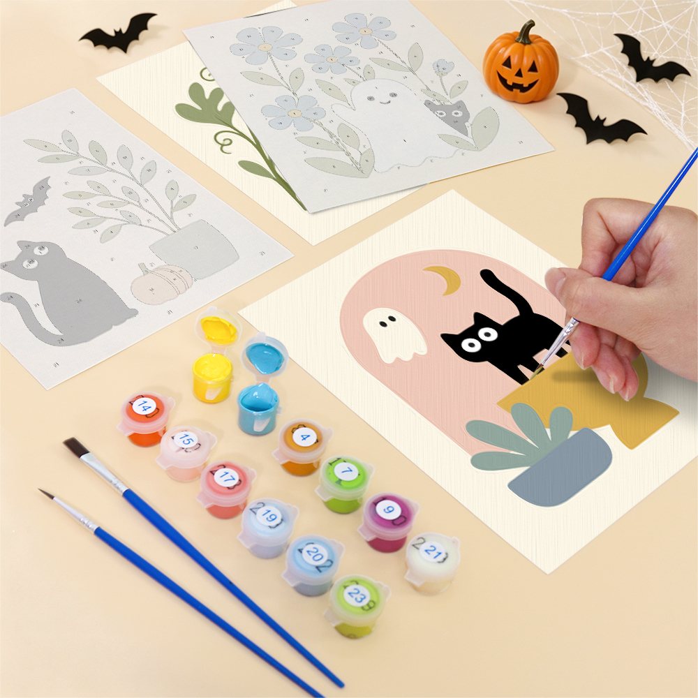 Filling in a Botanical Black Cats mini canvas with numbered acrylic paints and a fine brush