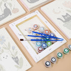 Numbered paint pots and brushes on a pre-stretched Botanical Black Cats mini canvas