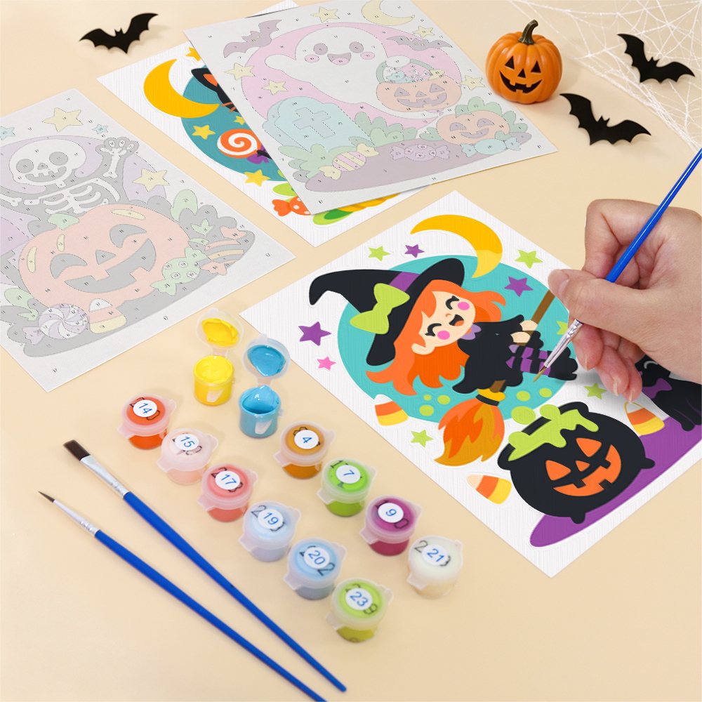 Filling in a Bright Halloween Buddies mini canvas with numbered acrylic paints and a fine brush