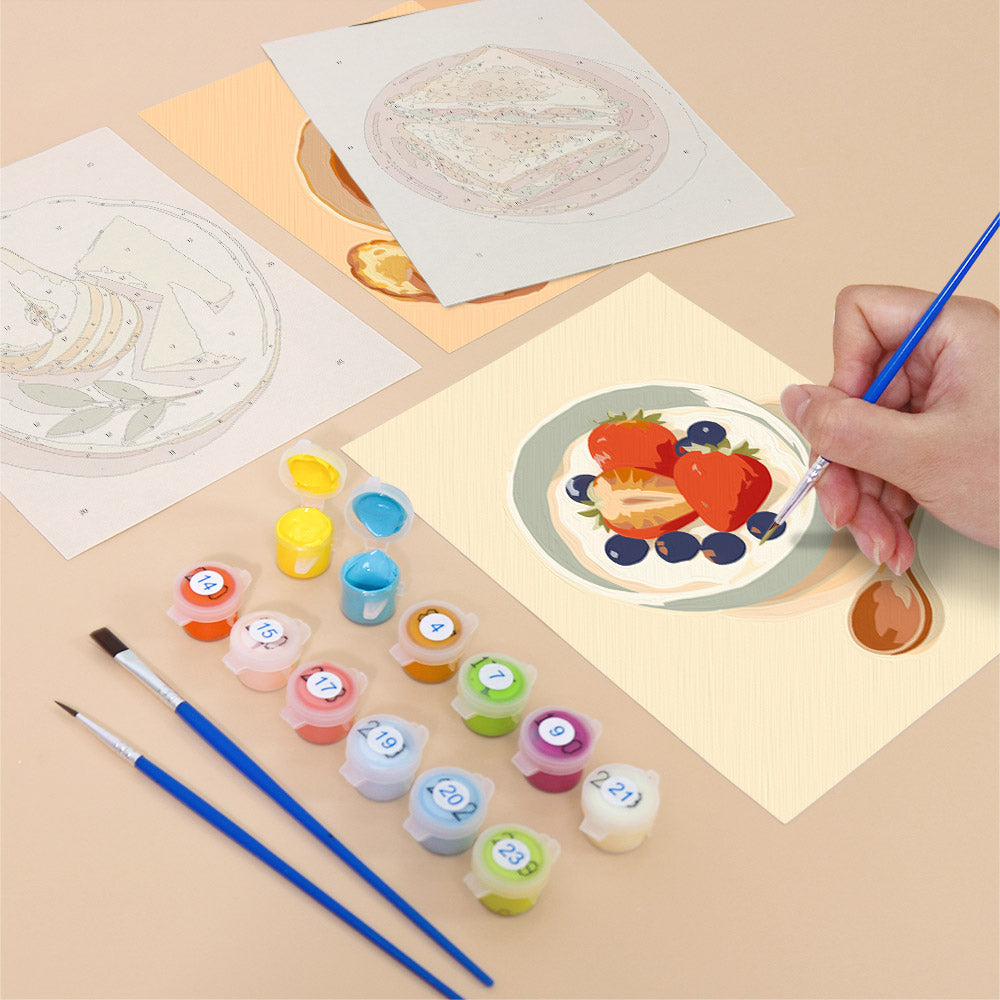 Filling in a Brunch Club mini canvas with numbered acrylic paints and a fine brush