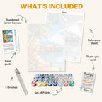 What's included in the Bungalows on the Lagoon paint by numbers kit: numbered linen canvas, reference sheet, color guide, 24 acrylic paints, 3 brushes and thank you card