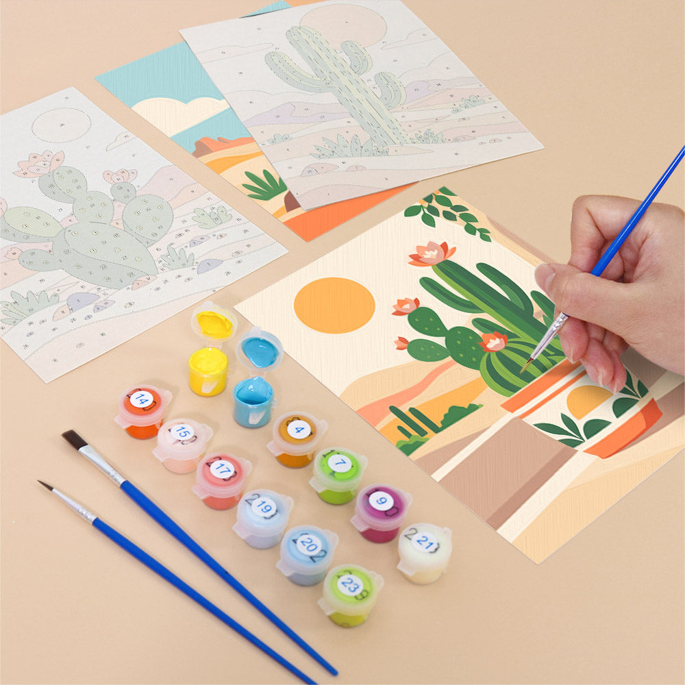 Filling in a Cactus Country mini canvas with numbered acrylic paints and a fine brush