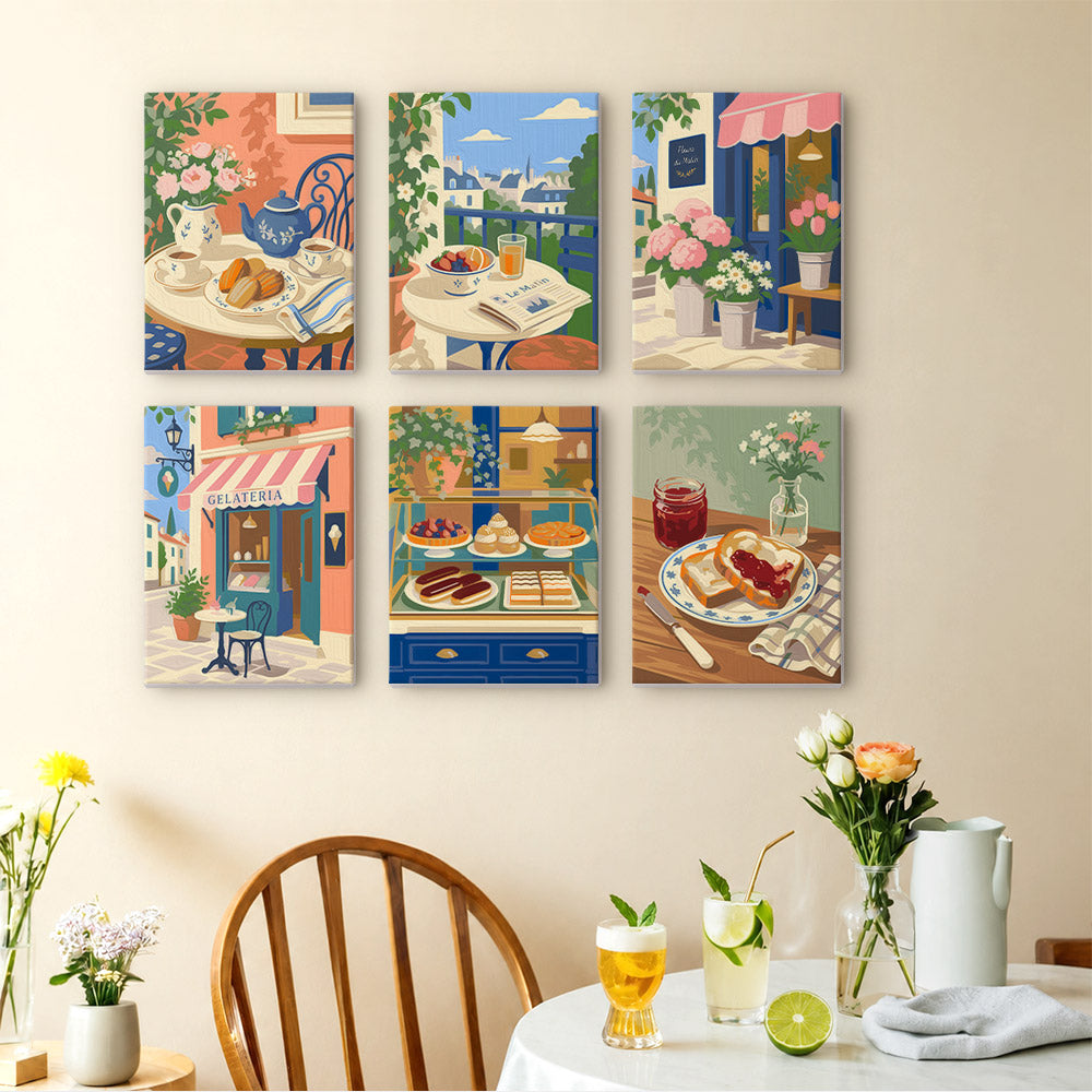 Café Mornings mini paintings displayed as a gallery wall in a sunny kitchen