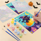 Filling in a Candy Sky Halloween mini canvas with numbered acrylic paints and a fine brush