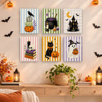 Candy Stripe Spooks mini paintings displayed as a gallery wall in a sunny kitchen