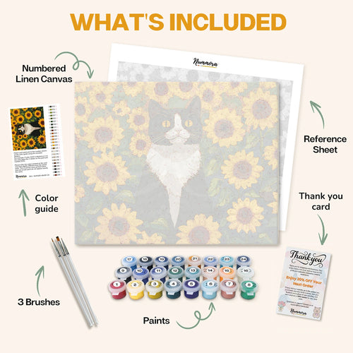 What's included in the Cat in a Golden Sea paint by numbers kit: numbered linen canvas, reference sheet, color guide, 24 acrylic paints, 3 brushes and thank you card