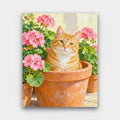 Cat in the Geraniums paint by numbers kit of a ginger tabby cat sitting inside a terracotta pot surrounded by pink geraniums