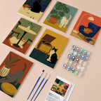 Cats at Home mini paint by numbers kit with six numbered canvases, acrylic paints, brushes and layout