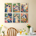 Cats in Bloom mini paintings displayed as a gallery wall in a sunny kitchen