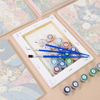 Numbered paint pots and brushes on a pre-stretched Cats in Bloom mini canvas