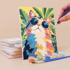 Painting a Cats in Bloom mini canvas propped up beside numbered acrylic paints
