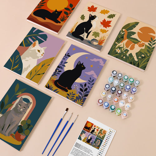 Cats Through the Seasons mini paint by numbers kit with six numbered canvases, acrylic paints, brushes and layout
